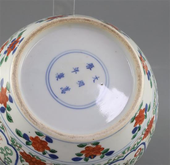 A Chinese wucai dragon jar, Qing dynasty, H. 16.5cm, repair to rim